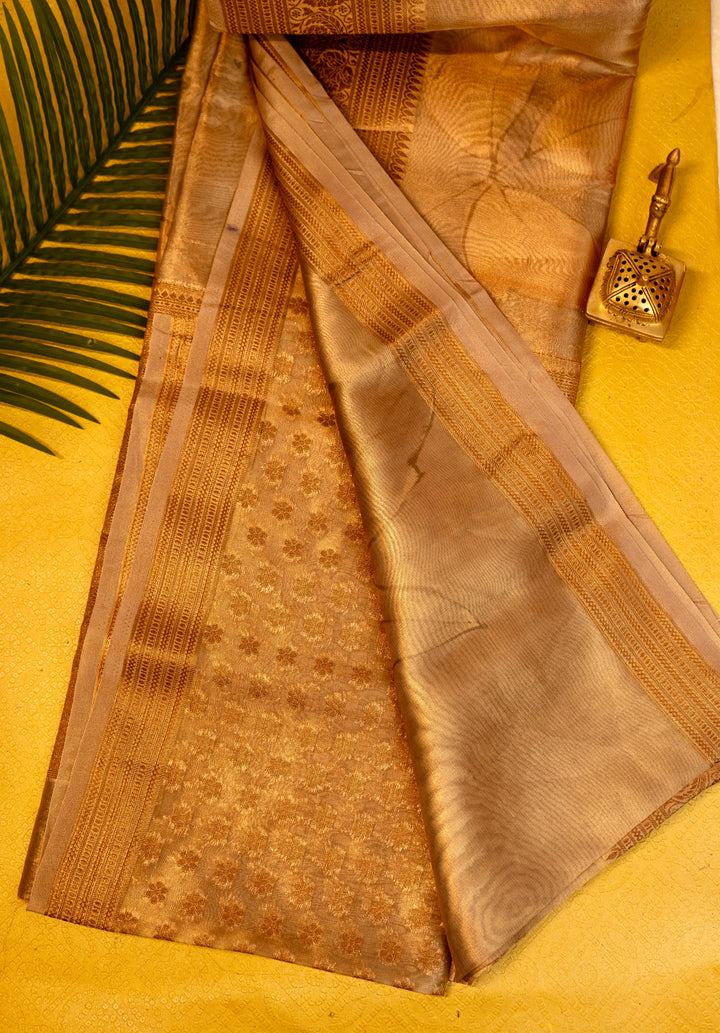 Designer saree in brown gold with floral paisley motifs