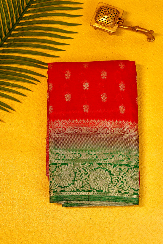 Designer saree in red with woven green motifs