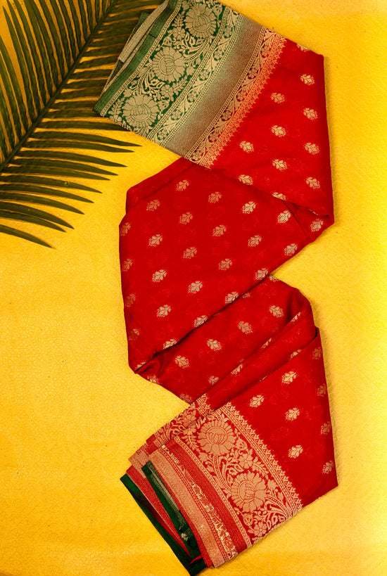 Designer saree in red with woven green motifs