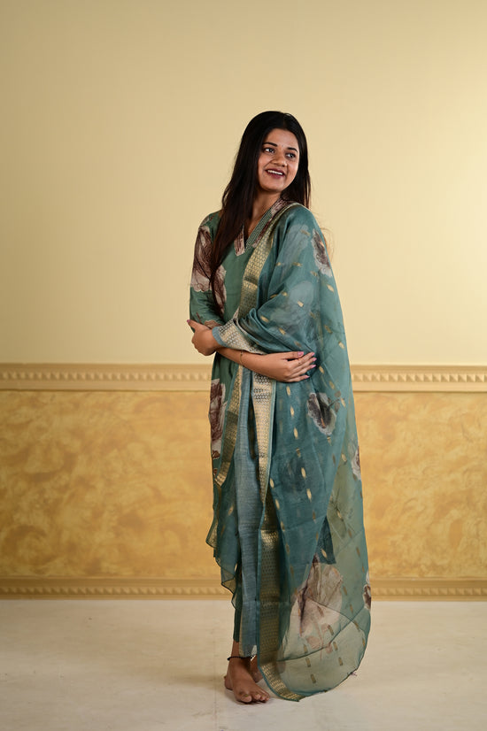 Aaradhana salwar set in light green with vertican fabric