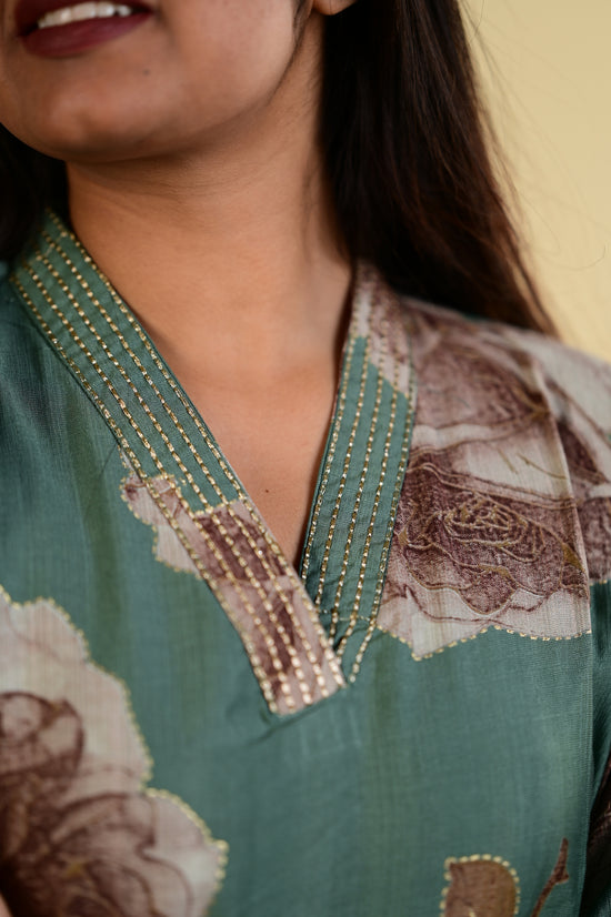 Aaradhana salwar set in light green with vertican fabric