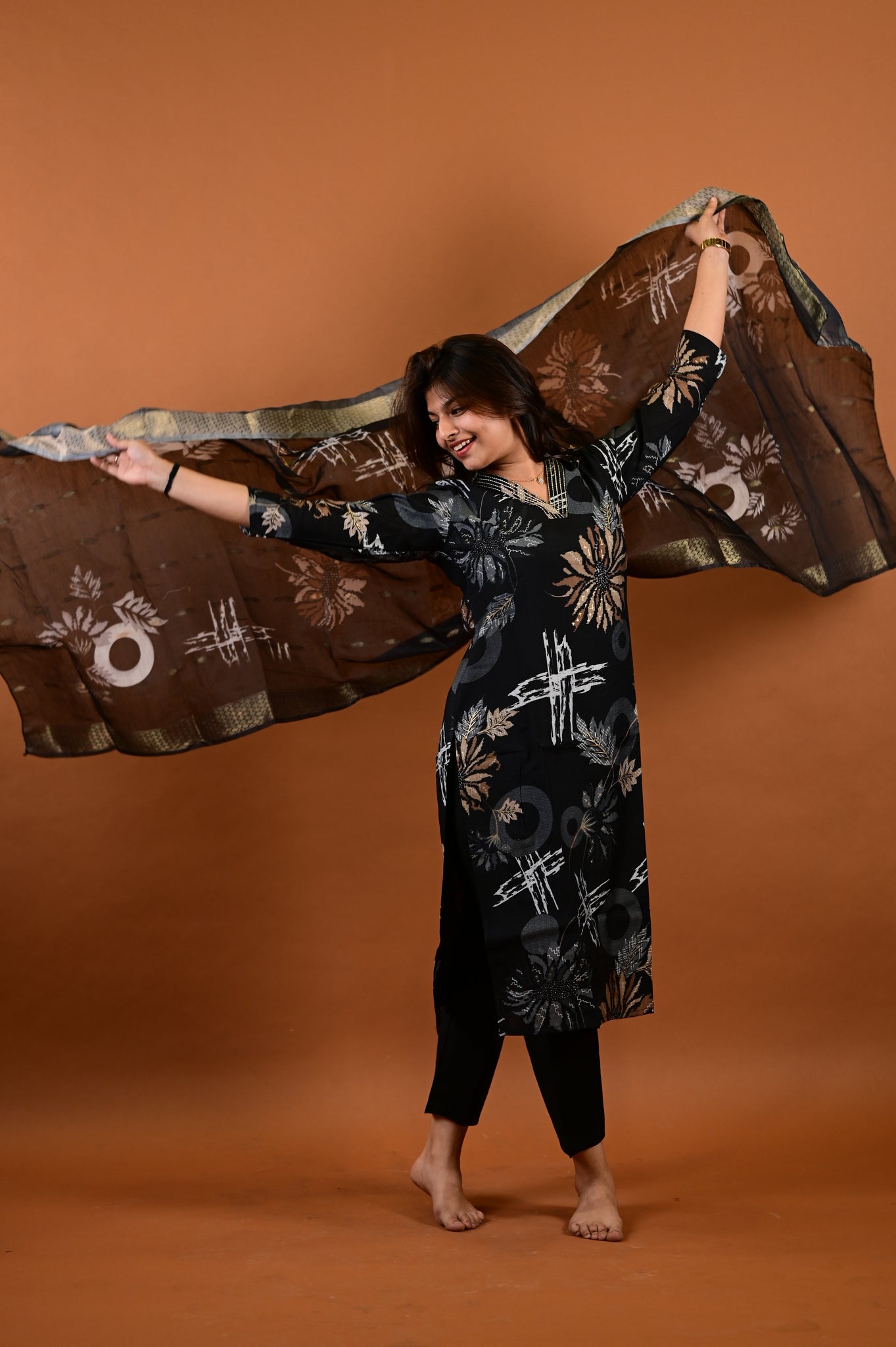Saanvi salwar set in black with flower design in vertican fabric