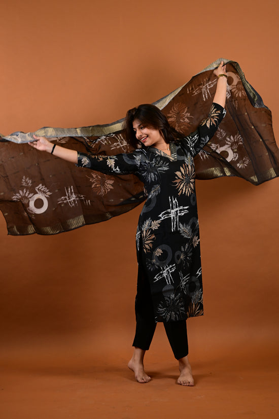 Saanvi salwar set in black with flower design in vertican fabric