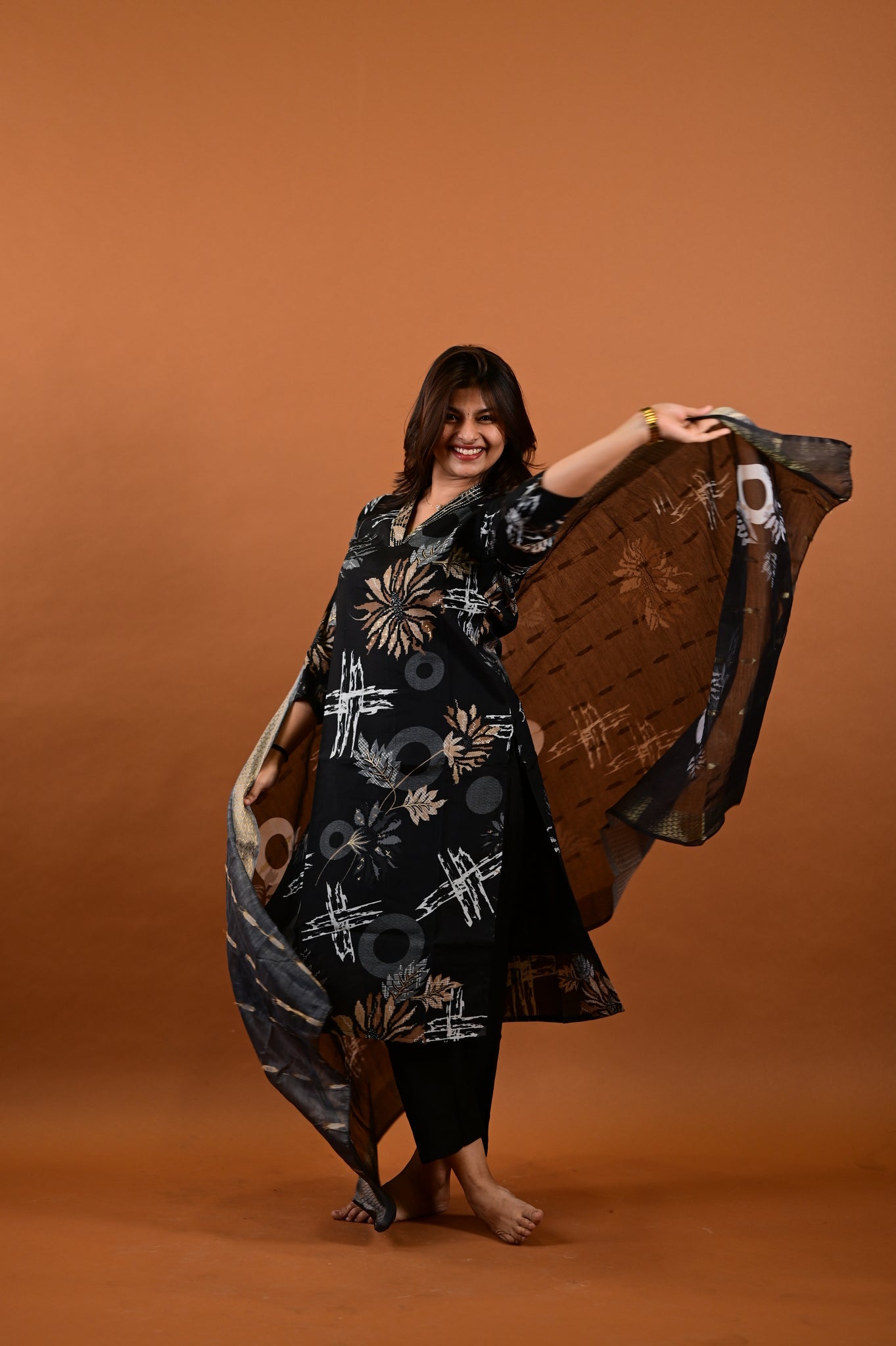 Saanvi salwar set in black with flower design in vertican fabric