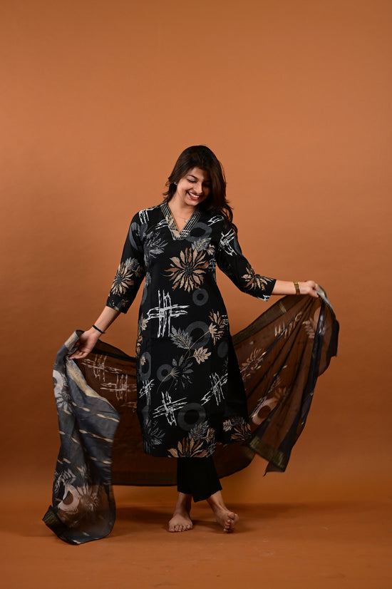 Saanvi salwar set in black with flower design in vertican fabric