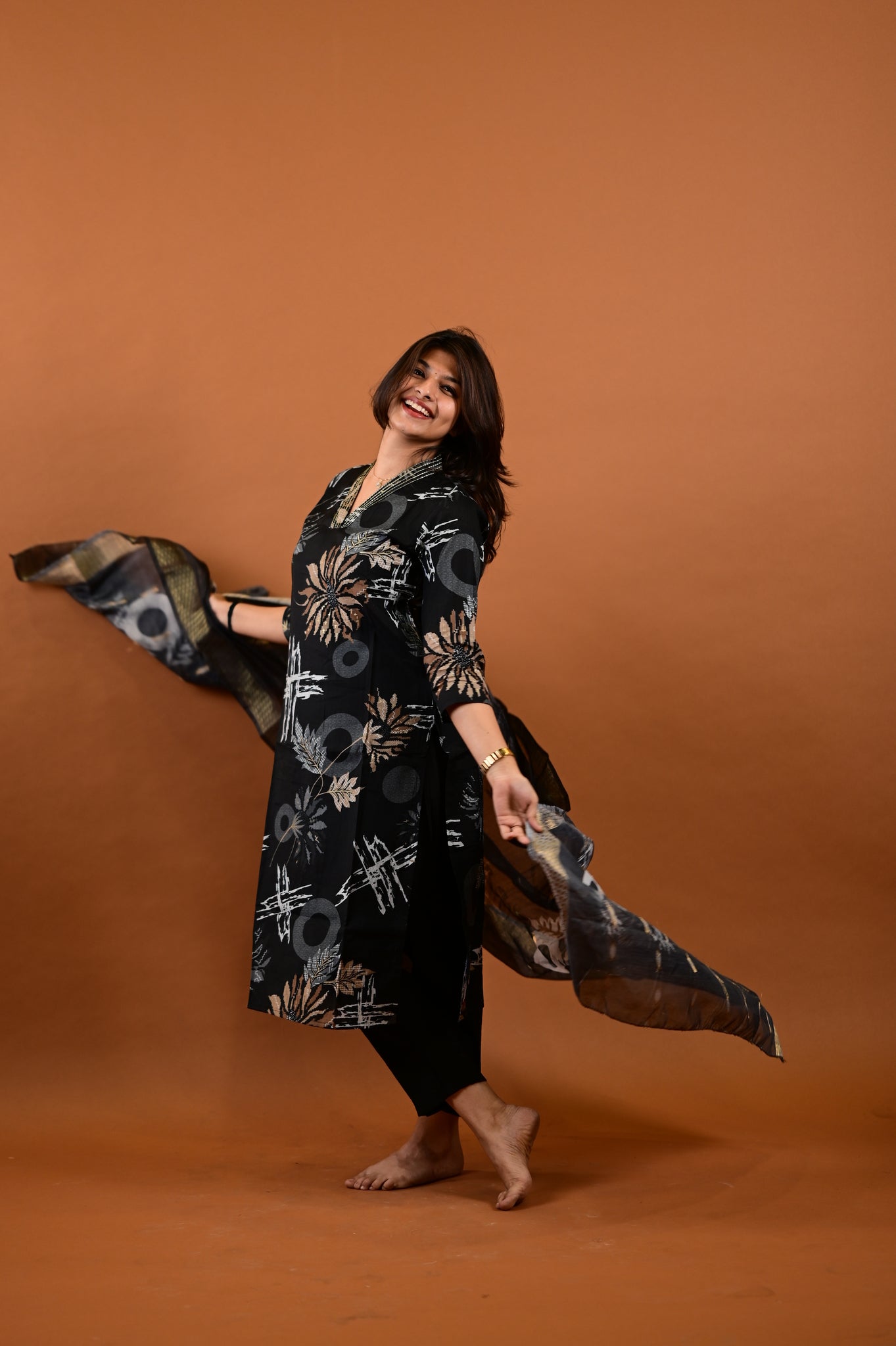 Saanvi salwar set in black with flower design in vertican fabric