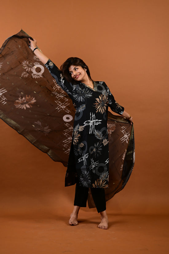 Saanvi salwar set in black with flower design in vertican fabric