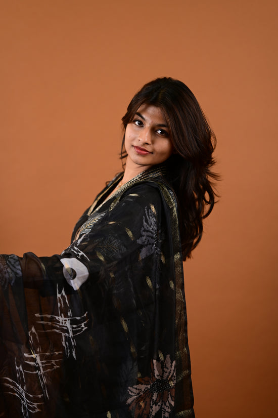 Saanvi salwar set in black with flower design in vertican fabric