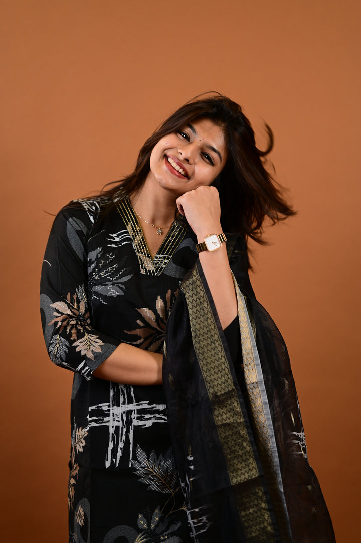 Saanvi salwar set in black with flower design in vertican fabric
