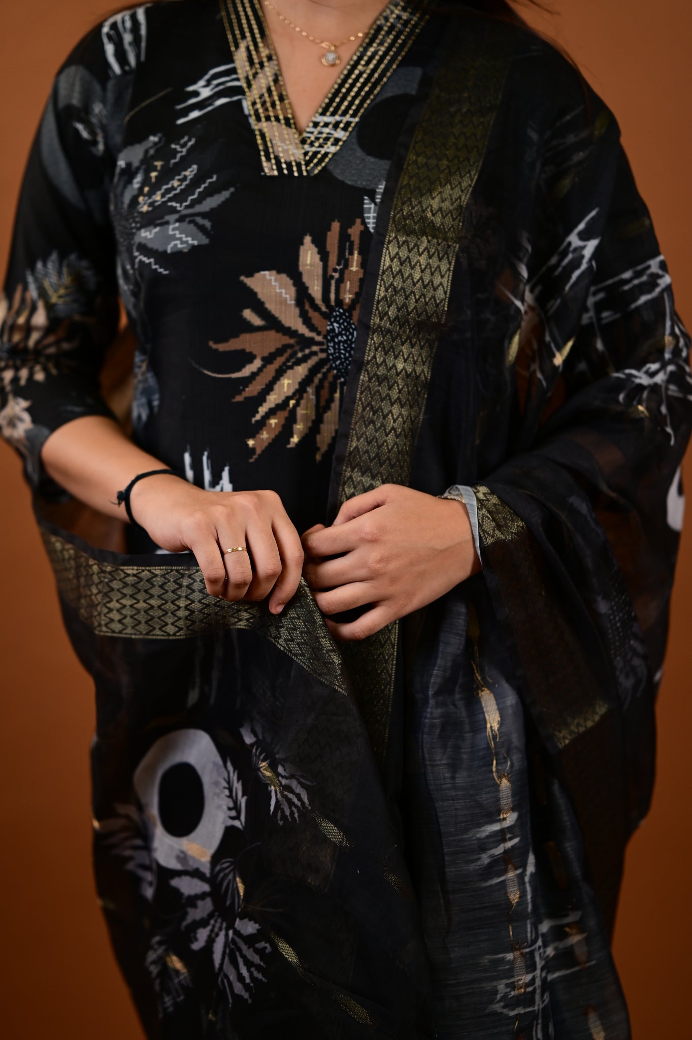 Saanvi salwar set in black with flower design in vertican fabric