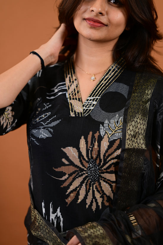 Saanvi salwar set in black with flower design in vertican fabric